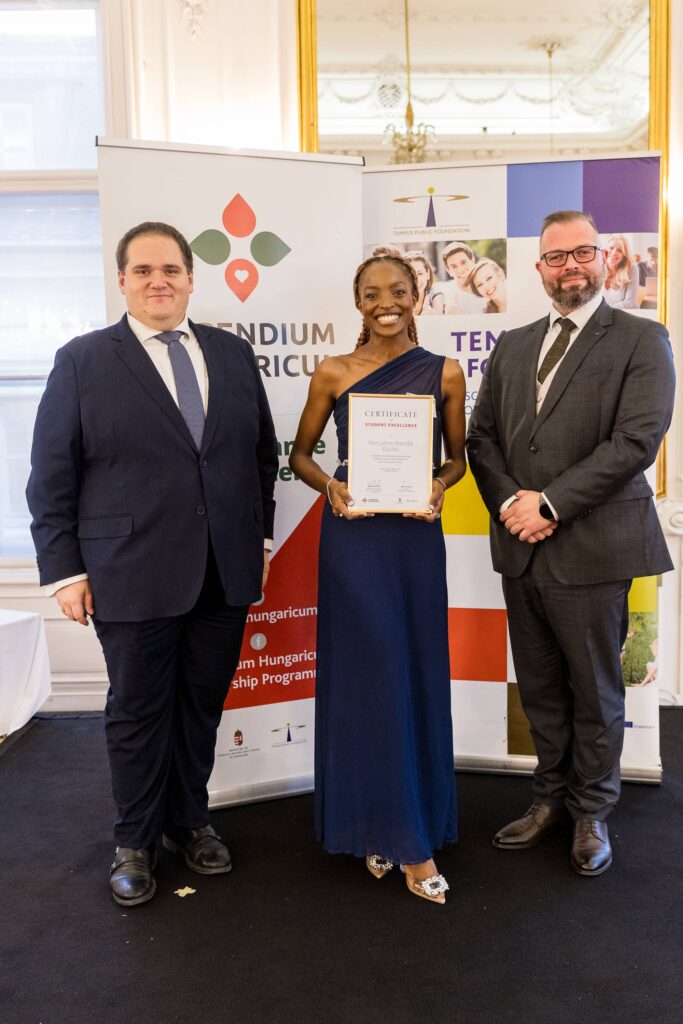Maryanne Wandia Guchu receiving the award