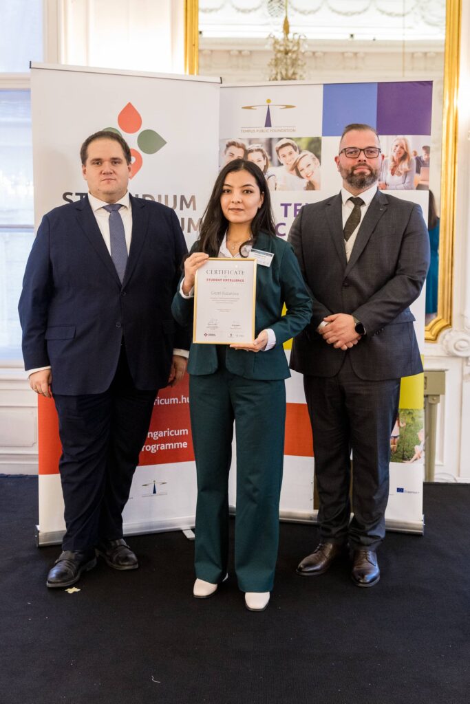 Gozel Bazarova receiving the award