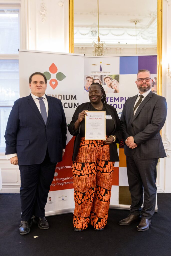 Juliet Adongo Omondi receiving the award