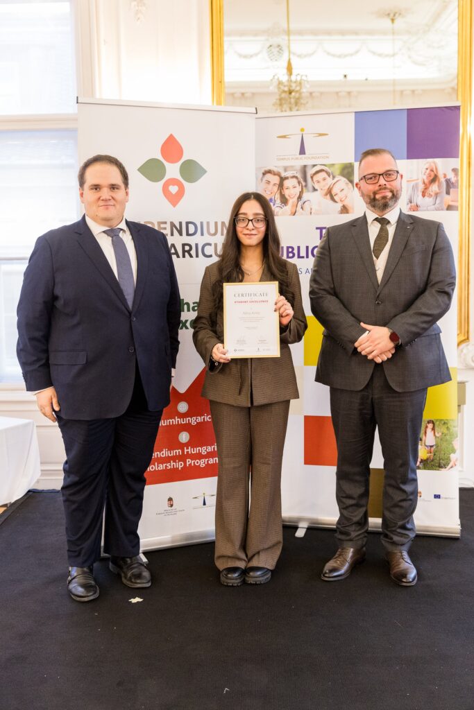 Alina Areej receiving the award