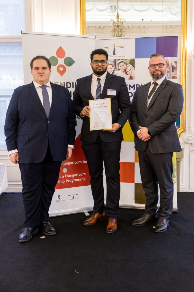 Muees Moosa receiving the award